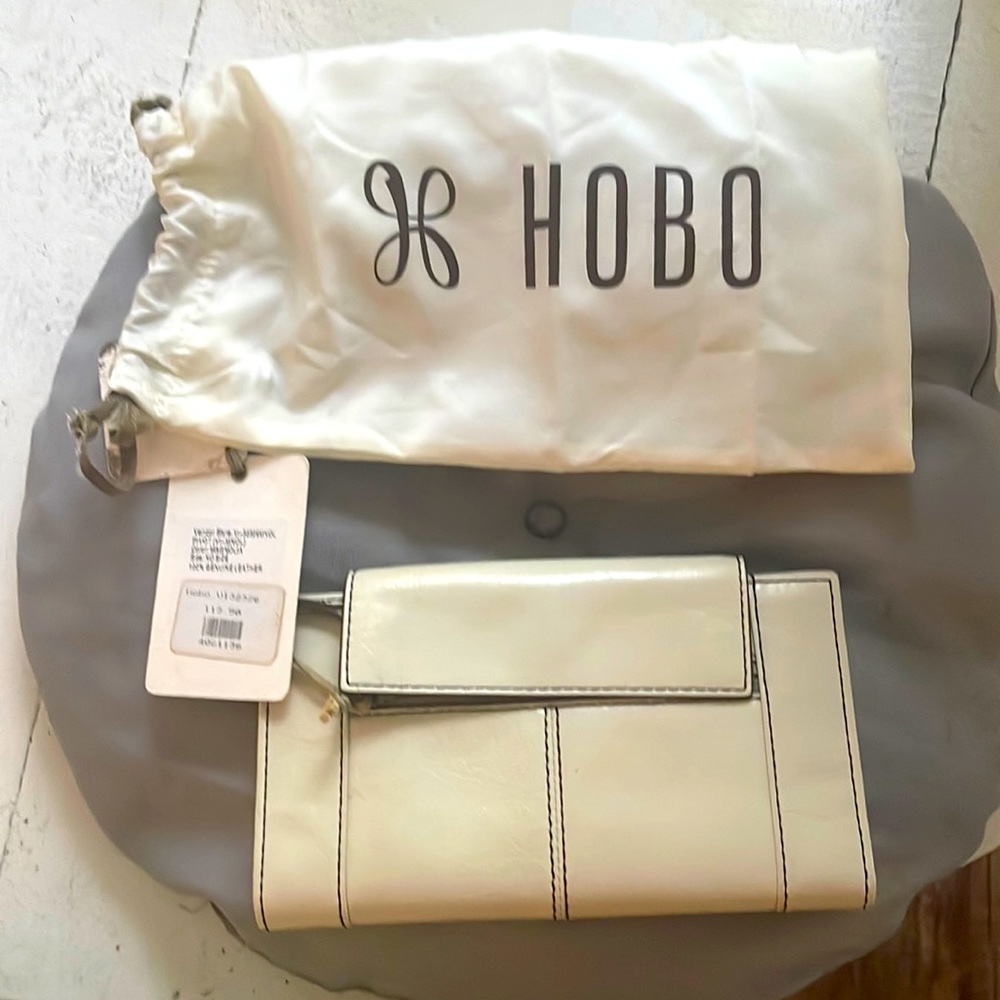 HOBO.new with retail tag $113 many card slots zippered front pocket